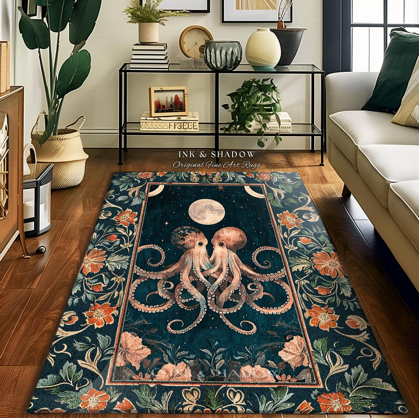 May include: A teal blue rug with an intricate floral border. The center of the rug features a pair of stylized octopuses with a full moon in the background. The rug has the text 'Ink & Shadow Original Fine Art Rugs' at the top.