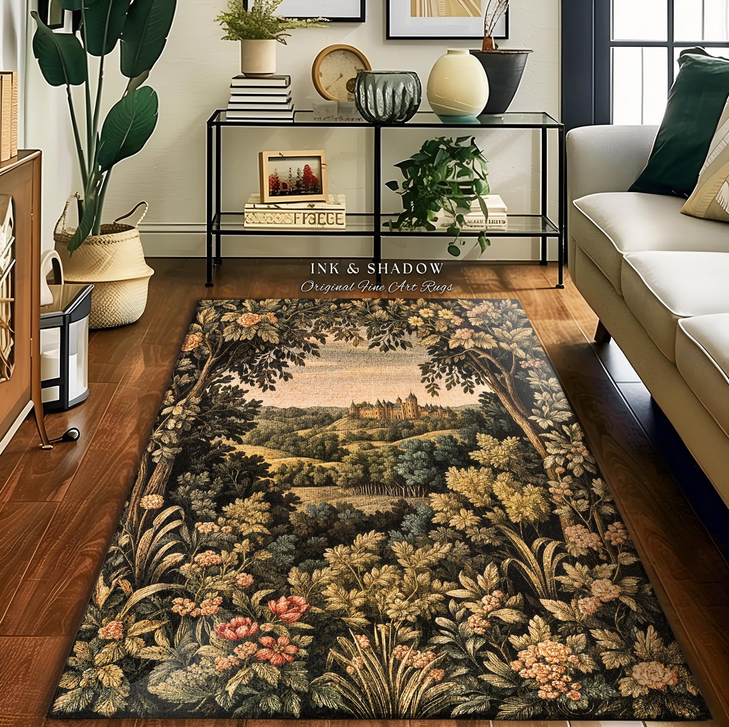 May include: A tapestry rug with a dark green background and a landscape scene with a castle in the distance. The rug has a floral design with pink, white, and yellow flowers. The rug is made of high-quality materials and is perfect for adding a touch of elegance to any room. 'INK & SHADOW Original Fine Art Rugs' is printed on the rug.
