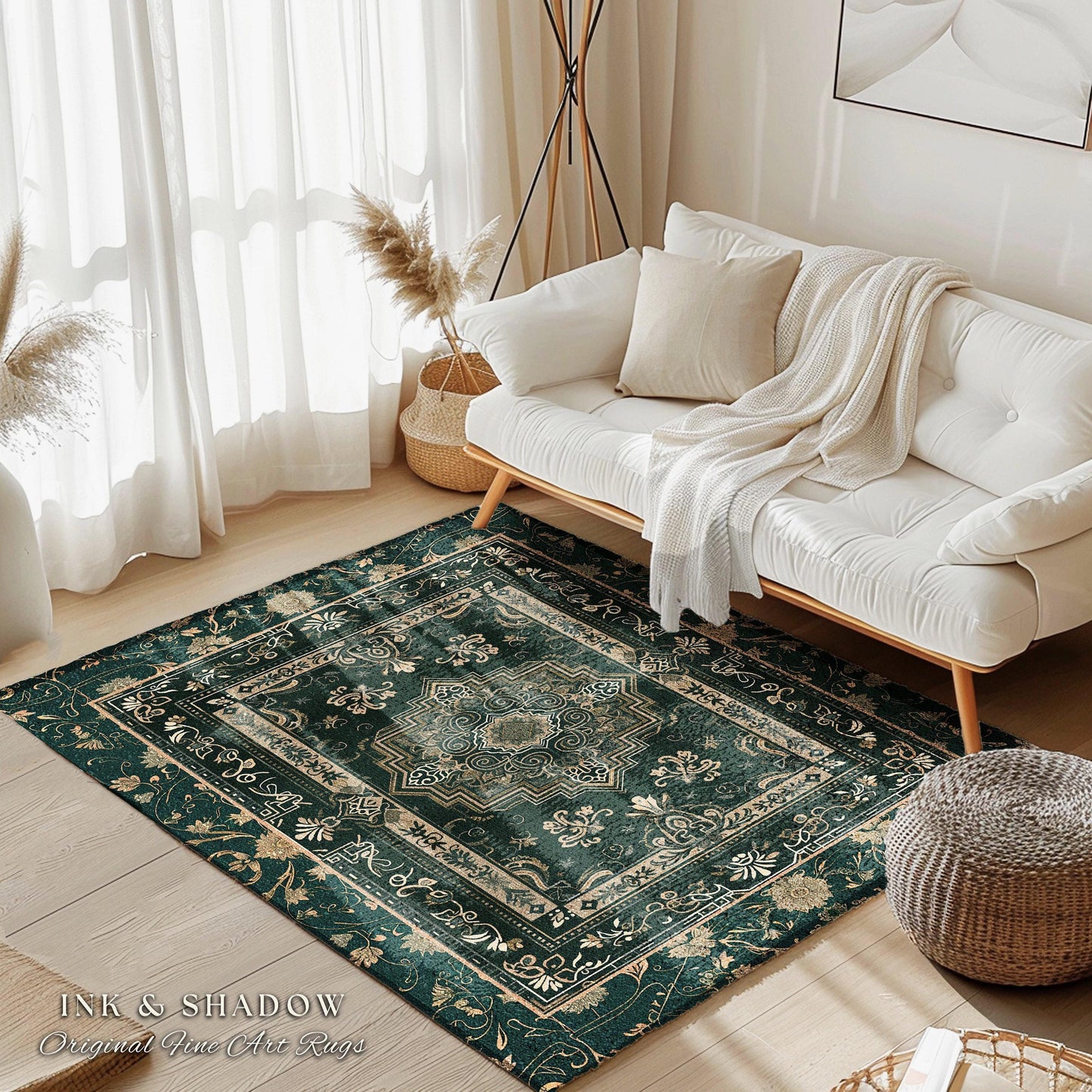 a living room with a white couch and a green rug