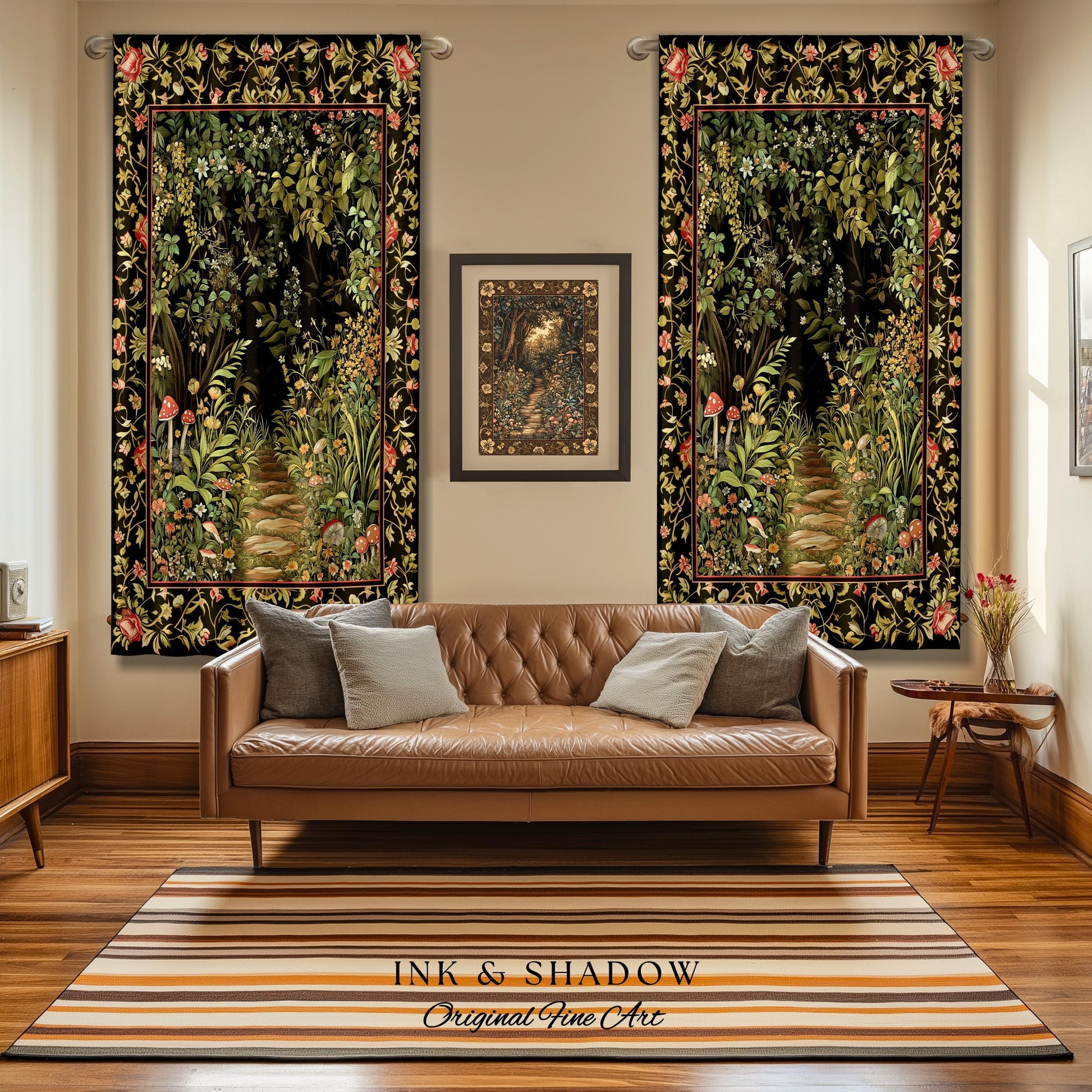 May include: Two black framed tapestries with a dark green and brown woodland scene with a path leading into the woods. The tapestries are hanging on a wall with a brown leather couch in front of them. The couch has two pillows on it. The floor is a light brown wood floor with a striped rug in front of the couch. The rug has stripes of brown, white, and orange. The text &#39;INK & SHADOW Original Fine Art&#39; is on the rug.