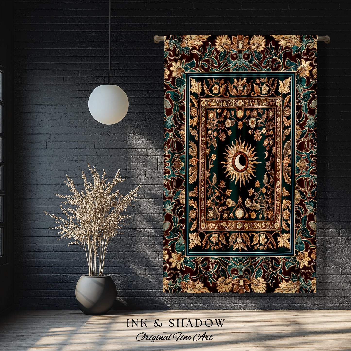 May include: A tapestry with a dark green background and gold and teal accents. The tapestry features a sun and moon design in the center surrounded by floral patterns. The tapestry is hanging on a black brick wall.
