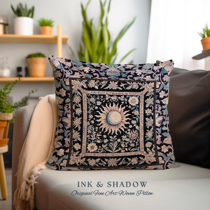 May include: A square throw pillow with a black background and a woven design of a sun and moon in a floral frame. The pillow has a white border and the text &#39;INK & SHADOW Original Fine Art Woven Pillow&#39; is printed below the pillow.