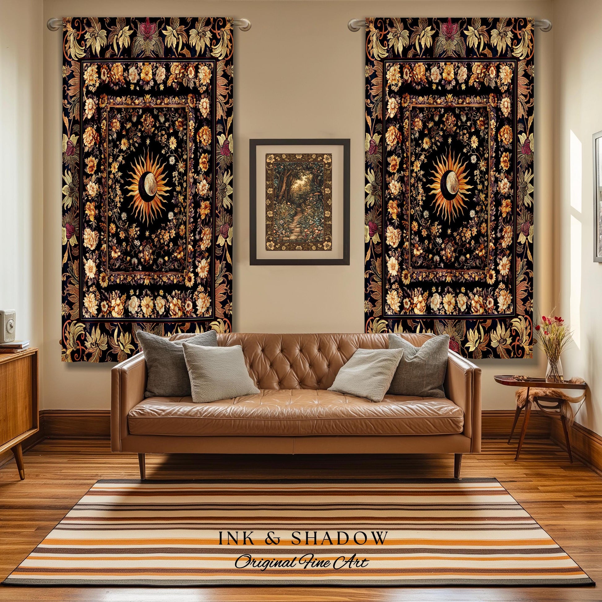May include: Two black tapestries with gold and white floral patterns and a sun and moon design. The tapestries are hanging on a wall in a living room with a brown leather couch and a striped rug. The text on the rug reads &#39;INK & SHADOW Original Fine Art&#39;.