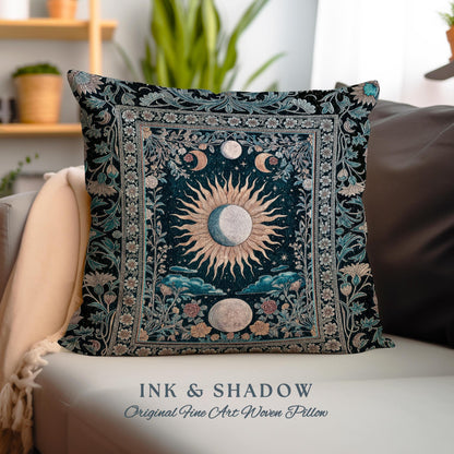 May include: A decorative pillow with a dark blue background featuring a woven tapestry design of a sun and moon with floral accents. The pillow has the text &#39;INK & SHADOW Original Fine Art Woven Pillow&#39; at the bottom.