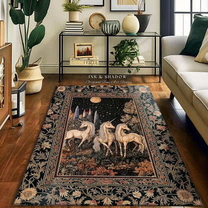 May include: A black and gold tapestry rug with a floral border. The center of the rug features a dark background with a full moon and three white unicorns. The text &#39;INK & SHADOW Original Fine Art Rugs&#39; is printed in white at the top of the rug.