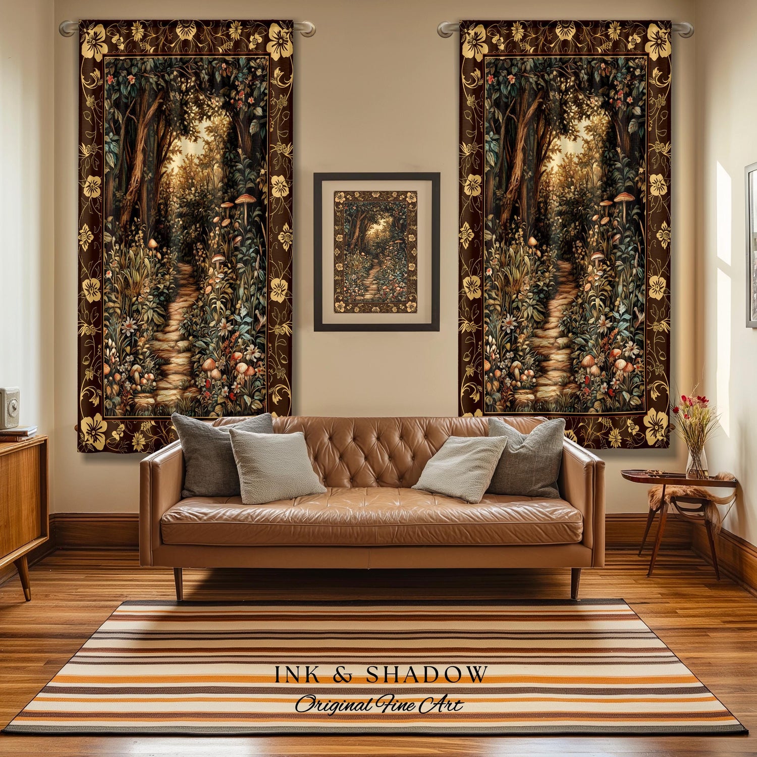 May include: Two brown tapestry wall hangings with a forest path scene. The tapestries are hung on a beige wall above a brown leather couch. The couch has two pillows. A brown rug with orange and white stripes is in front of the couch. The rug has the text 'INK & SHADOW Original Fine Art' printed on it.