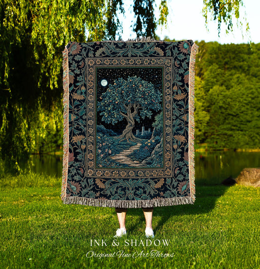 May include: A tapestry throw blanket featuring a detailed illustration of a tree under a starry night sky with a full moon. The blanket has a dark background with floral borders and fringe. The text "INK & SHADOW Original Fine Art Throws" is at the bottom.