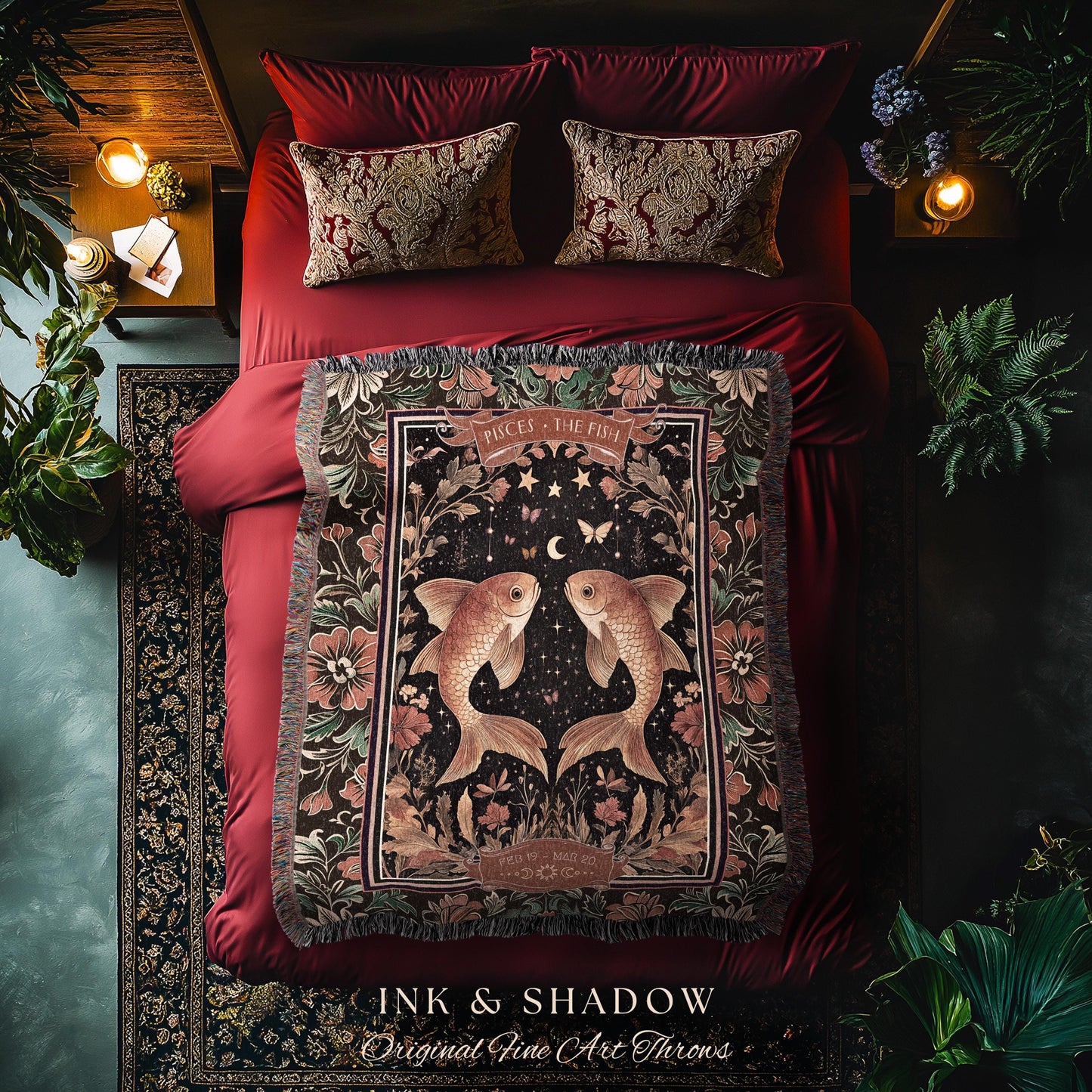 May include: A black and gold woven throw blanket with a tapestry design featuring two gold fish with a crescent moon and stars in the background. The blanket has a fringe border and the text 'Pisces - The Fish' in a gold font. The text 'Ink & Shadow Original Fine Art Throws' is at the bottom of the blanket.