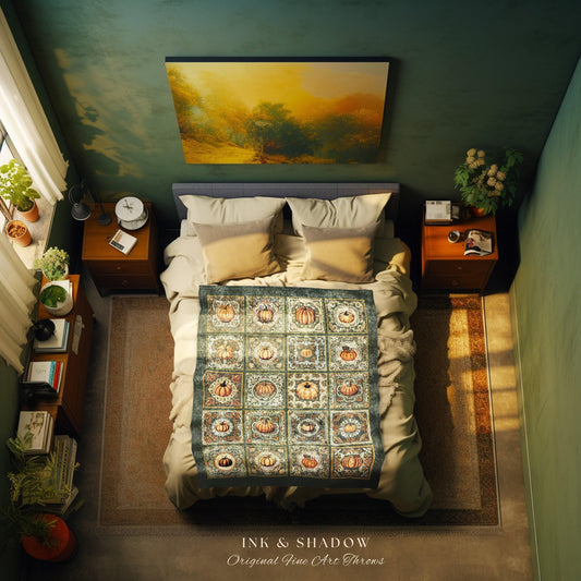 May include: A green and brown throw blanket with a pumpkin pattern. The blanket is on a bed with white bedding and two pillows. The bed is in a room with green walls and a painting hanging above the bed. The text on the blanket reads 'INK & SHADOW Original Fine Art Throws'.