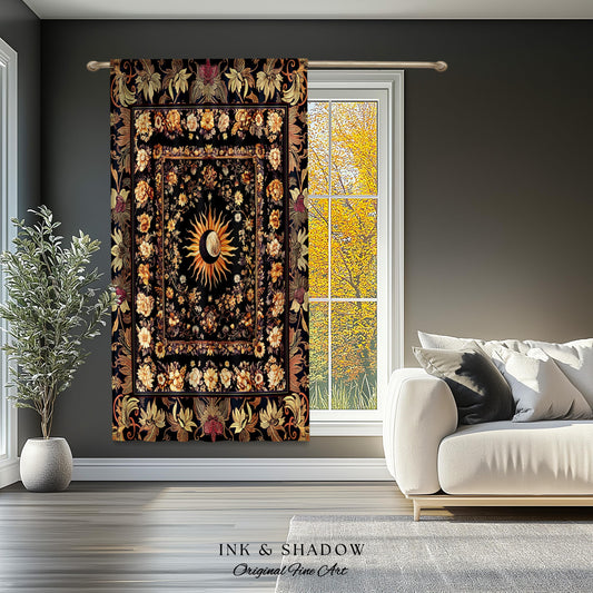 May include: A tapestry featuring a black background with a gold sun and moon design surrounded by a floral border. The tapestry is hanging on a wall in a room with a window and a white couch.