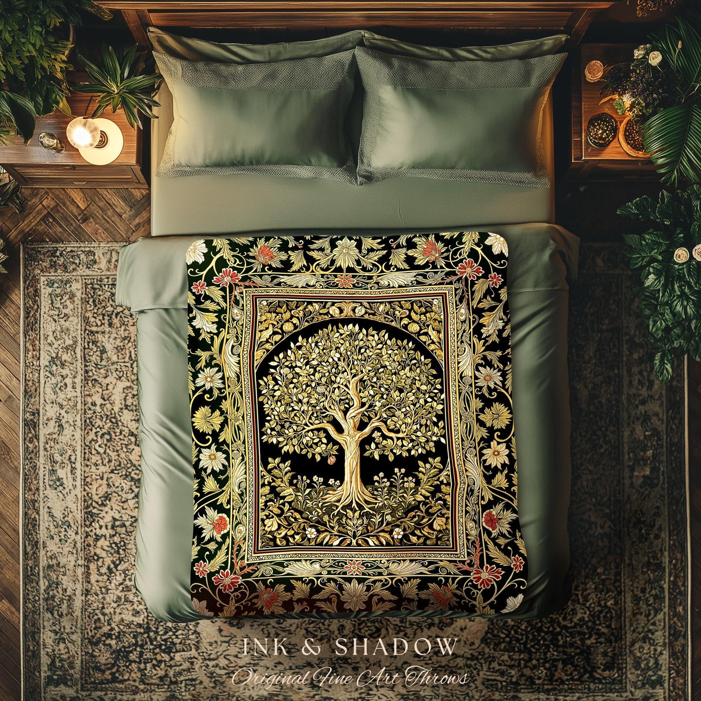 May include: A decorative throw blanket with a tree of life design, featuring gold and green leaves on a black background. The blanket is framed with floral and botanical patterns in red, gold, and green. The text "INK & SHADOW Original Fine Art Throws" is visible.