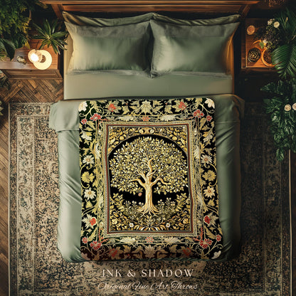 May include: A decorative throw blanket with a tree of life design, featuring gold and green leaves on a black background. The blanket is framed with floral and botanical patterns in red, gold, and green. The text "INK & SHADOW Original Fine Art Throws" is visible.