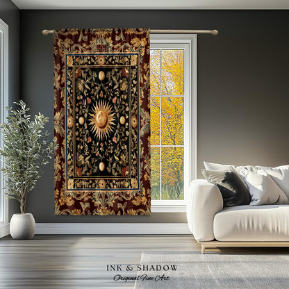 May include: A tapestry featuring a black and gold sun with a floral design. The tapestry is framed with a burgundy border and has a gold and black floral pattern. The tapestry is hanging on a gray wall.