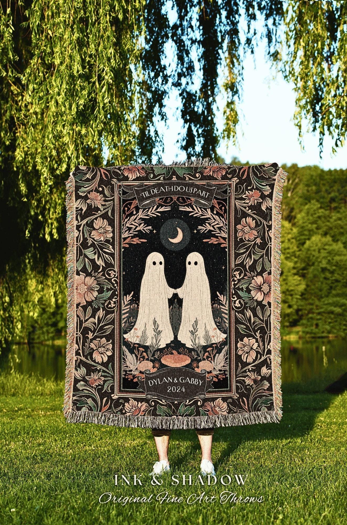 May include: A black throw blanket with a floral border and a central design featuring two white ghost figures holding hands under a crescent moon. The text "TIL DEATH DO US PART" and "DYLAN & GABBY 2024" are also visible.