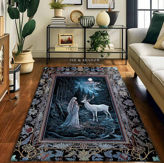 May include: A black and blue area rug with a detailed floral border. The center of the rug features a scene of a woman in a white dress standing in a forest with a white deer. The text "Ink & Shadow Original Fine Art Rugs" is printed on the rug.
