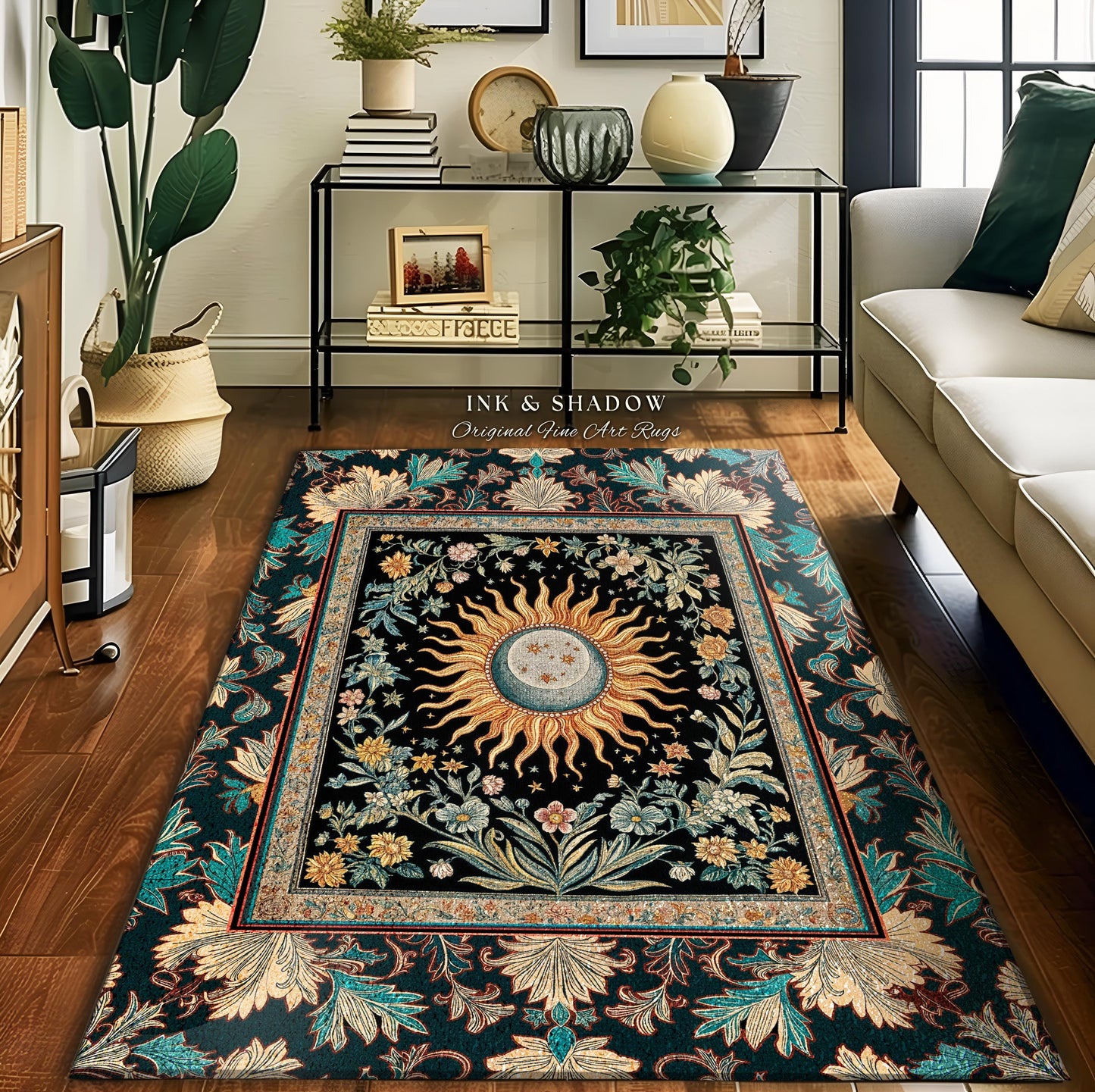 May include: A dark green rug with a black center featuring a gold sun with a moon and stars inside. The sun is surrounded by a floral design with a teal border. The rug has the text "INK & SHADOW Original Fine Art Rugs" at the top.