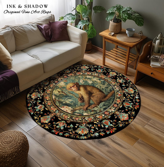 May include: A round black rug with a central image of a monkey in a botanical setting. The rug has a floral border in shades of red, orange, and green. The text "INK & SHADOW Original Fine Art Rugs" is at the top.