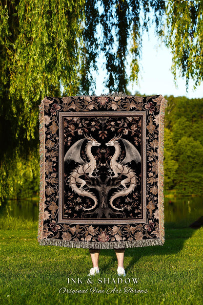 May include: A black throw blanket with a detailed design featuring two white dragons facing each other, set against a black background. The blanket has a floral border and fringe. The text "INK & SHADOW Original Fine Art Throws" is at the bottom.