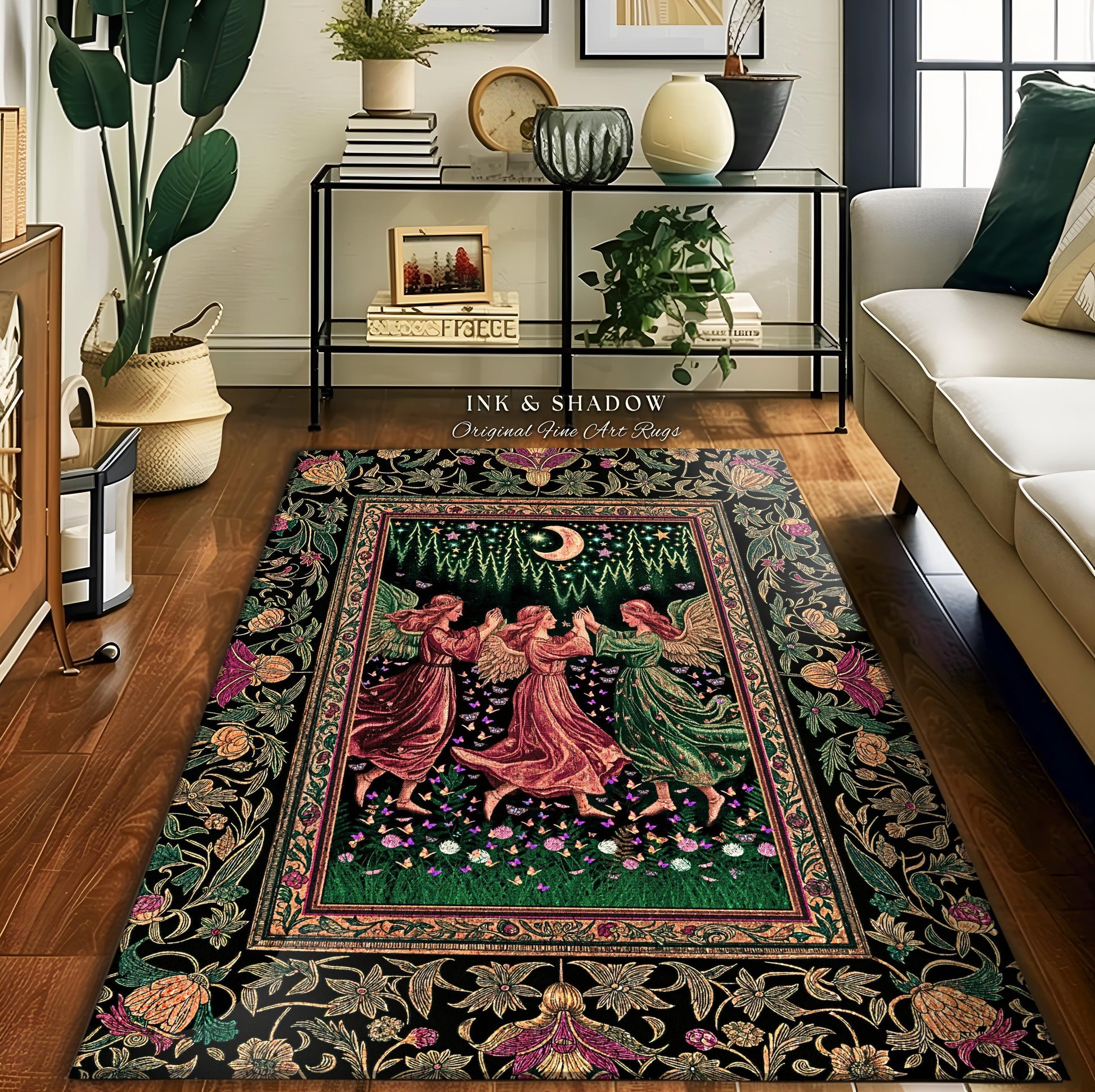 May include: A rectangular area rug with a black border featuring floral and foliate designs. The center depicts three figures dancing under a crescent moon. The rug has the text "INK & SHADOW Original Fine Art Rugs".