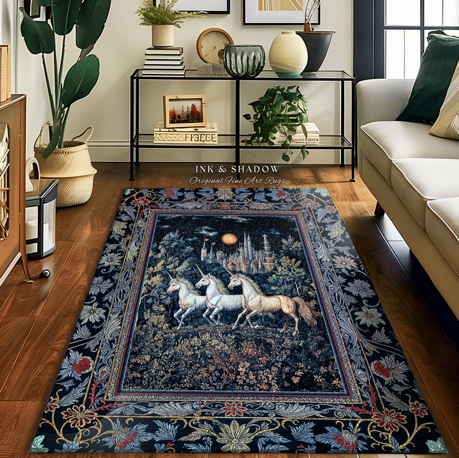 May include: A black and gold tapestry rug with a dark blue center featuring a scene of three white unicorns running through a forest with a castle in the background. The rug has a floral border with intricate details.