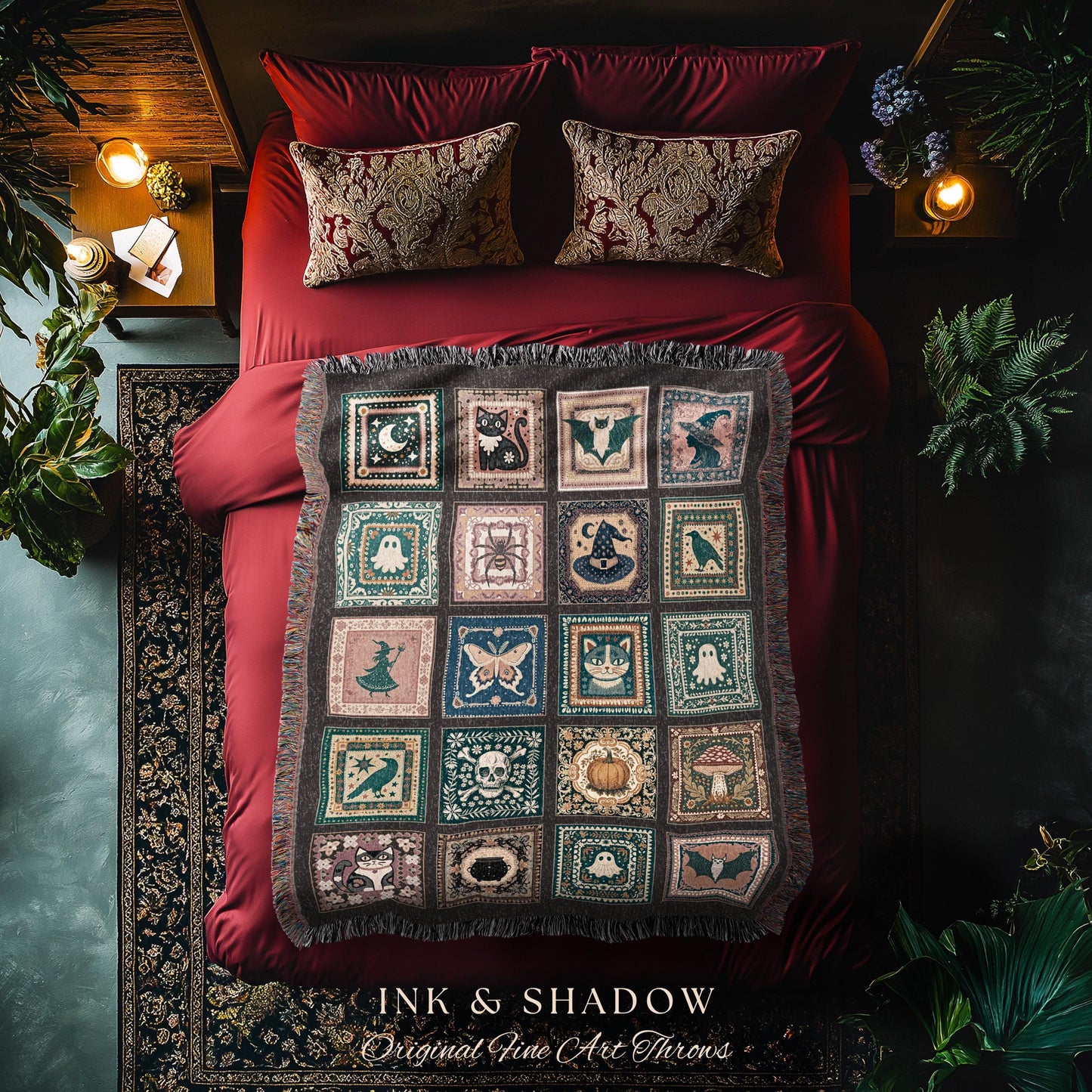 May include: A decorative throw blanket with a repeating pattern of Halloween-themed squares, including ghosts, bats, and cats. The blanket is displayed on a red bed with matching pillows. The text "INK & SHADOW Original Fine Art Throws" is at the bottom.