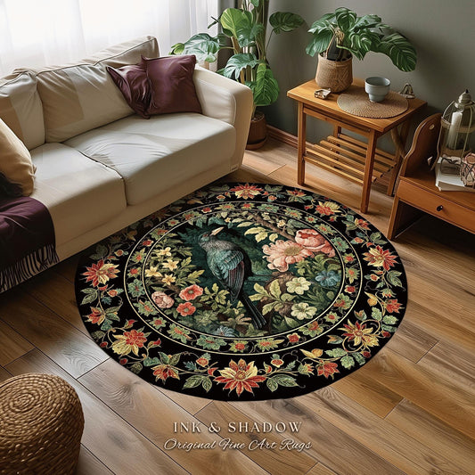 May include: Round black rug with a floral and bird design. The rug features a central image of a bird surrounded by flowers in shades of pink, yellow, and green. The border has a floral pattern, and the text "INK & SHADOW Original Fine Art Rugs" is at the bottom.