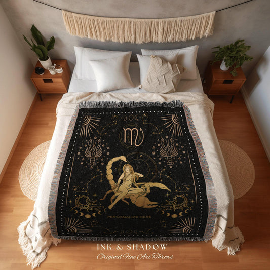 May include: Black and gold throw blanket featuring a Scorpio zodiac design. The blanket displays a scorpion, celestial elements, and the word "Scorpio". The text "INK & SHADOW Original Fine Art Throws" is at the bottom.