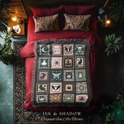 May include: A decorative throw blanket with a patchwork design featuring Halloween-themed images like bats, skulls, and ghosts. The blanket is displayed on a red bed with matching pillows. The text "INK & SHADOW Original Fine Art Throws" is at the bottom.