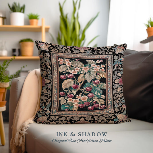 May include: A decorative square pillow with a black background and a central image of cherries and flowers. The pillow has a detailed floral border and the text "INK & SHADOW Original Fine Art Woven Pillow" at the bottom.