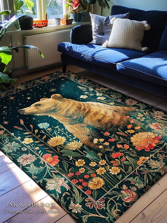 May include: A rectangular area rug with a detailed illustration of a bear in shades of brown and gold, surrounded by colorful flowers and foliage. The rug has a dark teal background with a border of stars and floral patterns. The rug is placed on a wooden floor.