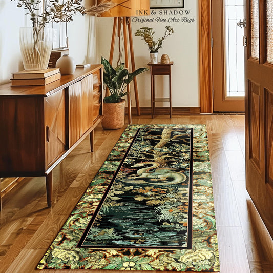 May include: A rectangular fine art rug with a black background and a detailed design featuring a dragon, water, and foliage in shades of green, yellow, and blue. The rug has a decorative border and the text "INK & SHADOW Original Fine Art Rugs".