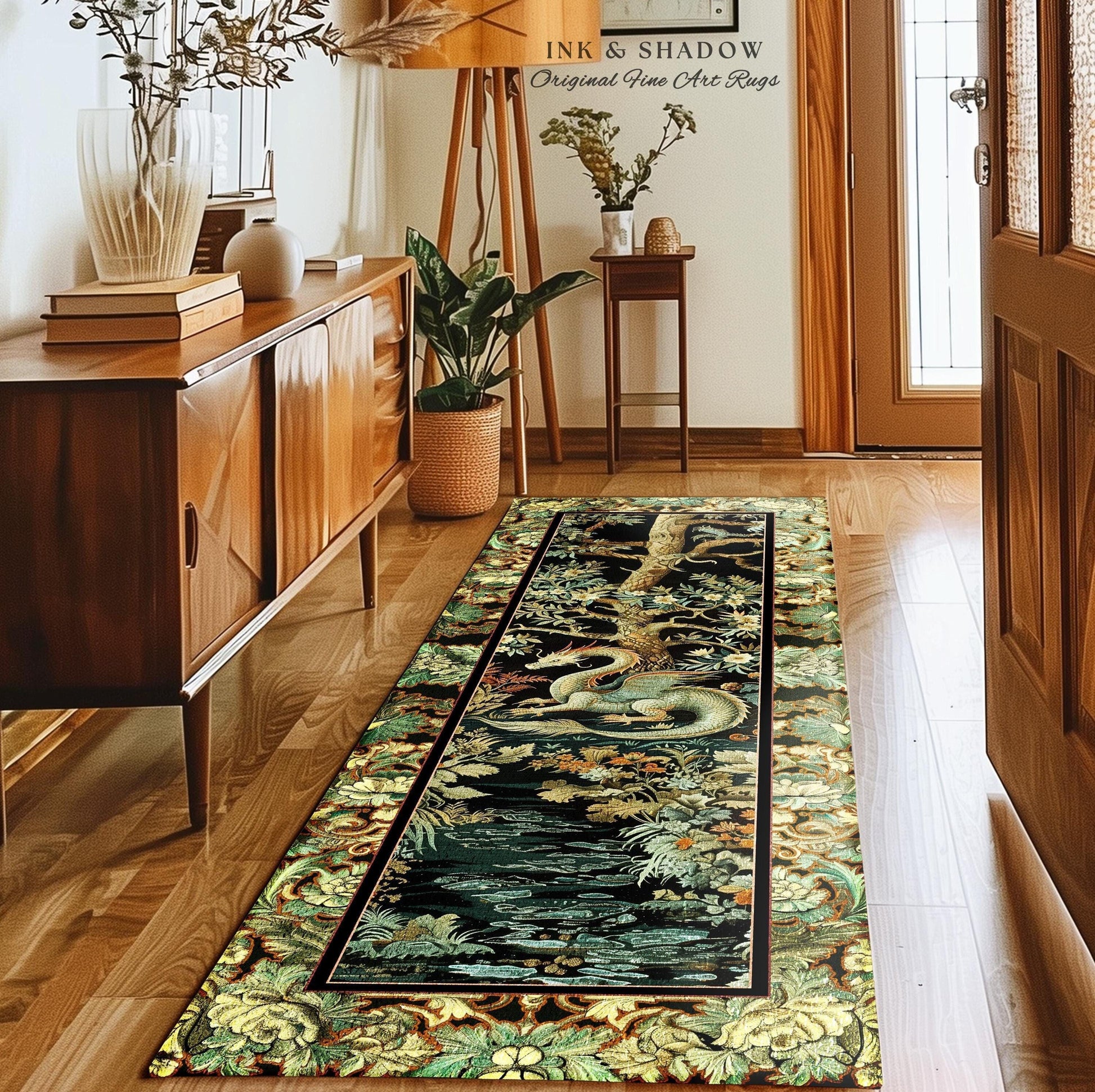 May include: A rectangular fine art rug with a black background and a detailed design featuring a dragon, water, and foliage in shades of green, yellow, and blue. The rug has a decorative border and the text "INK & SHADOW Original Fine Art Rugs".