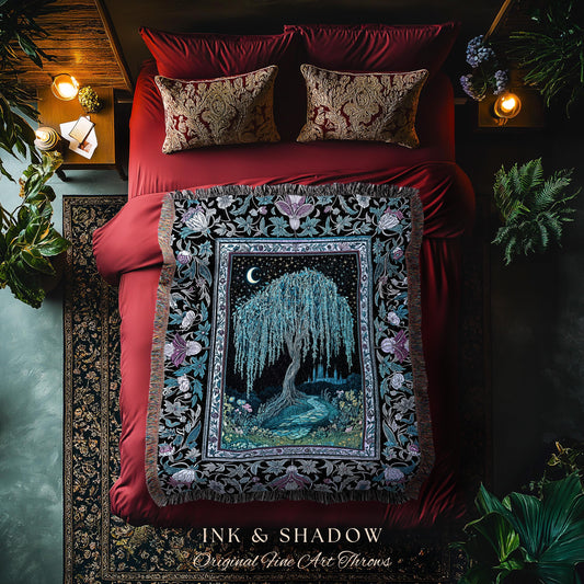 May include: A decorative throw blanket with a black border and a central image of a weeping willow tree under a crescent moon. The blanket is on a red bed with matching pillows. The text "INK & SHADOW Original Fine Art Throws" is at the bottom.