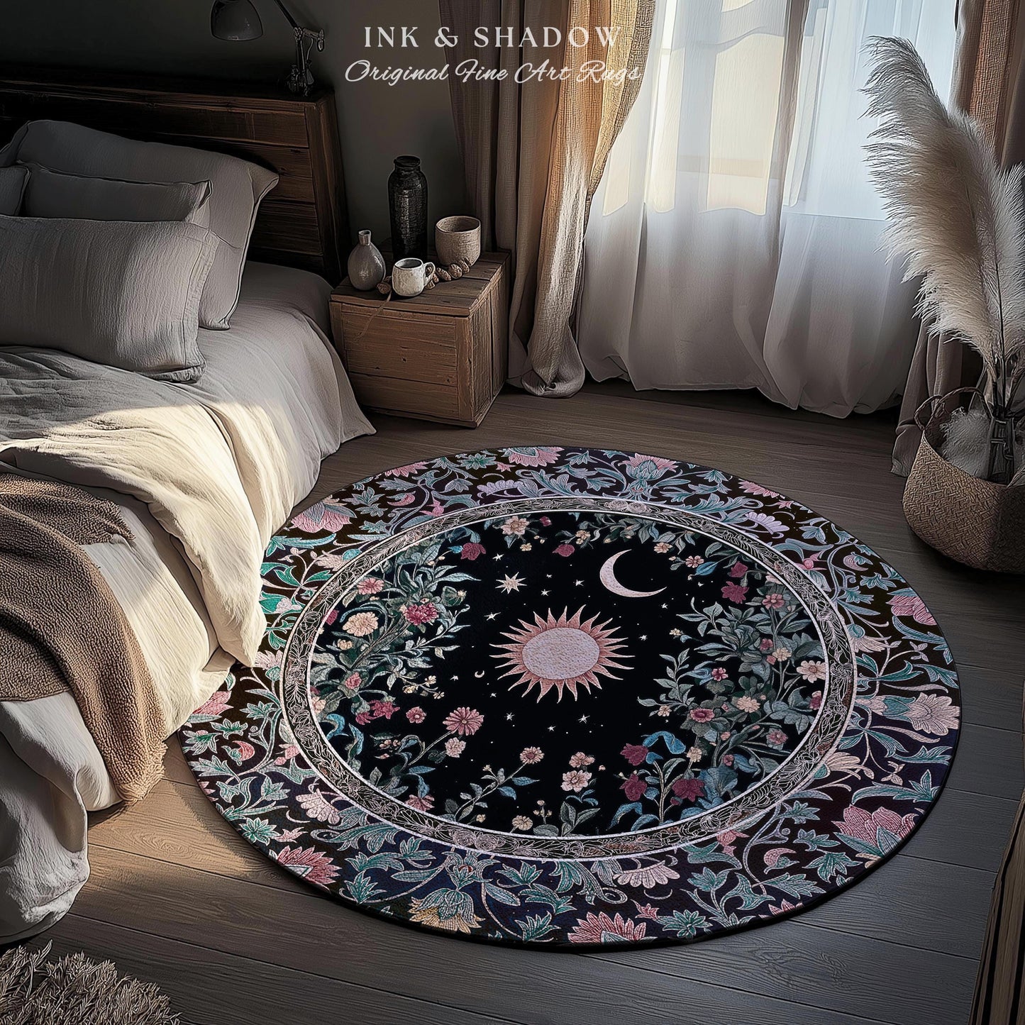 May include: A round black rug with a floral and celestial design. The rug features a central sun and moon motif surrounded by flowers and stars. The border has a floral pattern with pink, green, and blue accents. The text "INK & SHADOW Original Fine Art Rugs" is visible.
