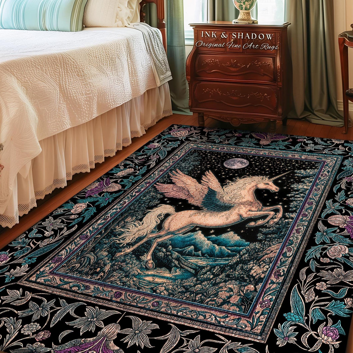 May include: A rectangular rug featuring a winged unicorn against a night sky backdrop with a full moon. The rug has a black border with floral patterns and the text "INK & SHADOW Original Fine Art Rugs".