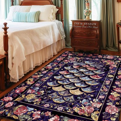 May include: A rectangular area rug with a dark blue background and a floral and geometric design. The rug features a border of flowers in shades of pink, yellow, and blue. The center has a repeating pattern of overlapping shapes. The text "INK & SHADOW Original Fine Art Rugs" is visible.