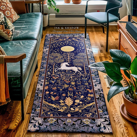 May include: A rectangular rug with a dark blue background and a detailed design featuring a white unicorn, trees, and floral elements. The rug has a border and the text "INK & SHADOW Original Fine Art Rugs".