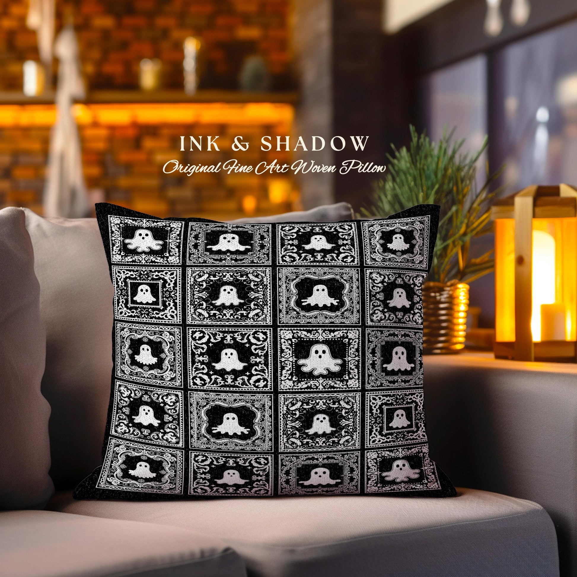 May include: Black and white throw pillow with a repeating pattern of ghosts in ornate frames. The pillow reads "INK & SHADOW Original Fine Art Woven Pillow".