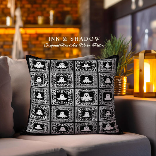 May include: Black and white throw pillow with a repeating pattern of ghosts in ornate frames. The pillow reads "INK & SHADOW Original Fine Art Woven Pillow".