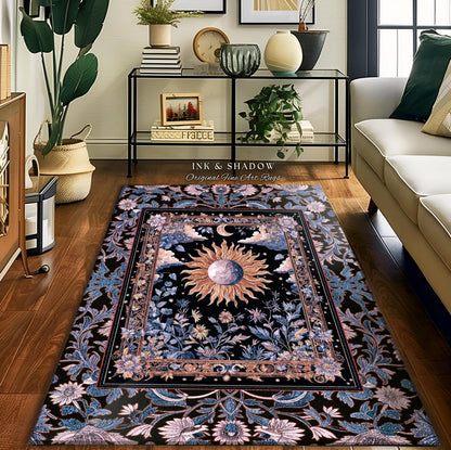 May include: A rectangular area rug with a black background and a central design featuring a sun, moon, and floral elements. The rug has a border with floral and leaf patterns in shades of blue, pink, and gold. The text "INK & SHADOW Original Fine Art Rugs" is visible.