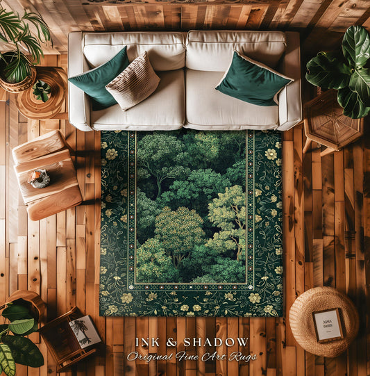 May include: Overhead view of a living room with a forest-themed rug. The rug features a detailed depiction of a forest in shades of green and gold, framed by a floral border. The text "INK & SHADOW Original Fine Art Rugs" is visible.