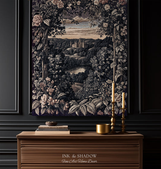 May include: A rectangular wall tapestry featuring a woven landscape scene of a distant castle surrounded by dense foliage, trees, and blooming flowers. The artwork is framed by a dark border and displays a muted color palette of deep greens, browns, and creams.