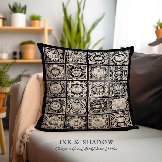 May include: Black and cream-colored decorative pillow with a repeating pattern of pumpkin illustrations in square frames. The pillow has a black border and is placed on a gray couch. The text "INK & SHADOW Original Fine Art Woven Pillow" is at the bottom.