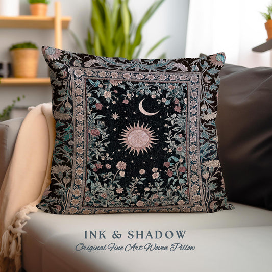 May include: A black woven pillow with a floral pattern and a sun and moon design in the center. The pillow has a border of intricate floral designs. The text "INK & SHADOW Original Fine Art Woven Pillow" is printed on the bottom of the image.