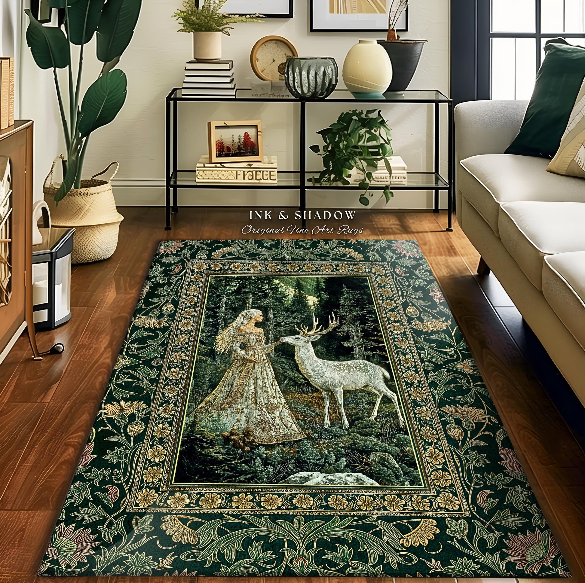 May include: A rectangular area rug with a dark green floral border and a central image of a woman and a deer in a forest. The rug has the text "INK & SHADOW Original Fine Art Rugs".