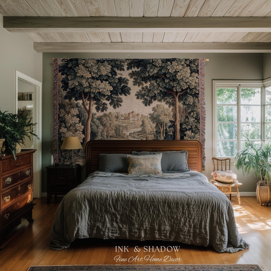 May include: A bedroom with a large tapestry depicting a forest scene above a wooden bed frame. The bed is covered with a gray comforter and pillows. The room has hardwood floors and a window with natural light. The text "INK & SHADOW Fine Art Home Decor" is at the bottom.