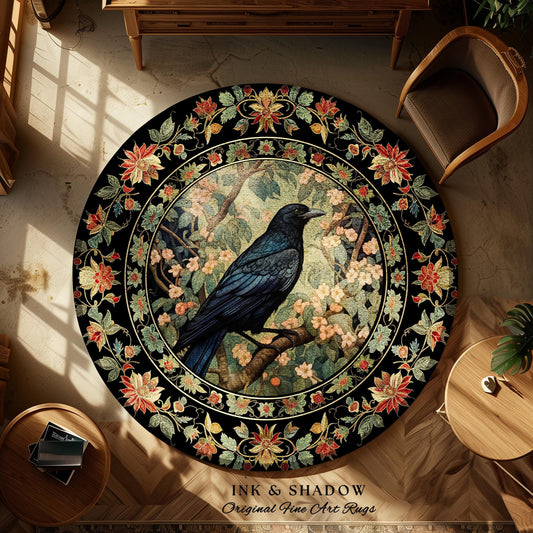 May include: Round black rug with a central image of a crow perched on a branch, surrounded by floral and foliage patterns. The rug has a decorative border with flowers in red, yellow, and green. The text "INK & SHADOW Original Fine Art Rugs" is at the bottom.
