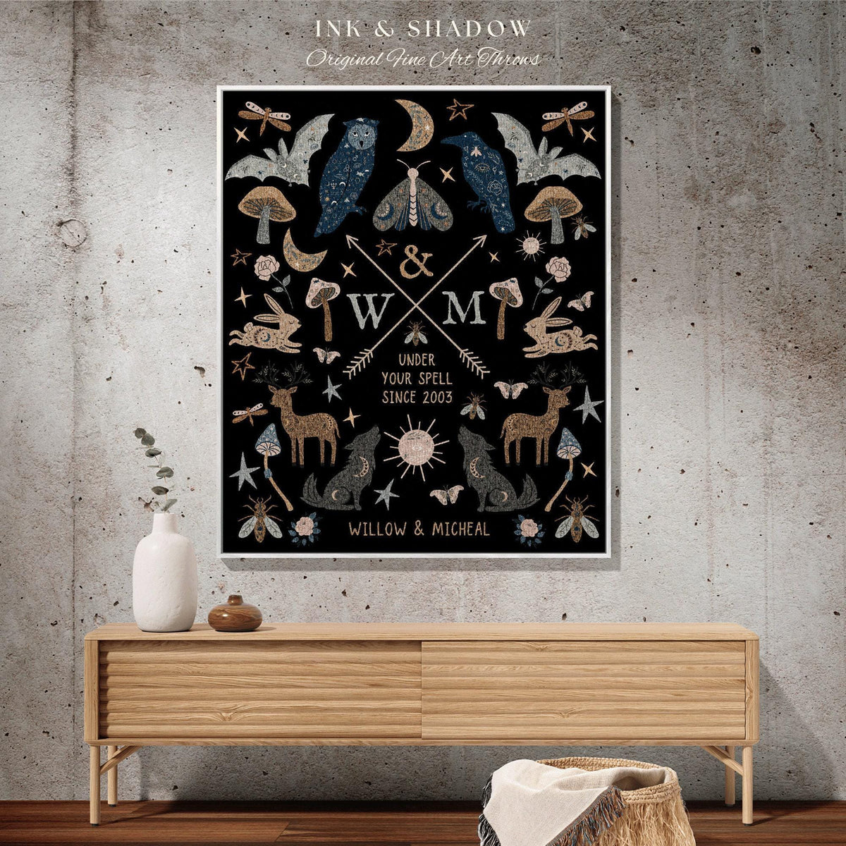 May include: A framed black art print with a whimsical design featuring woodland creatures, celestial elements, and the text "INK & SHADOW Original Fine Art Throws". The print includes the text "UNDER YOUR SPELL SINCE 2003" and the names "WILLOW & MICHEAL".