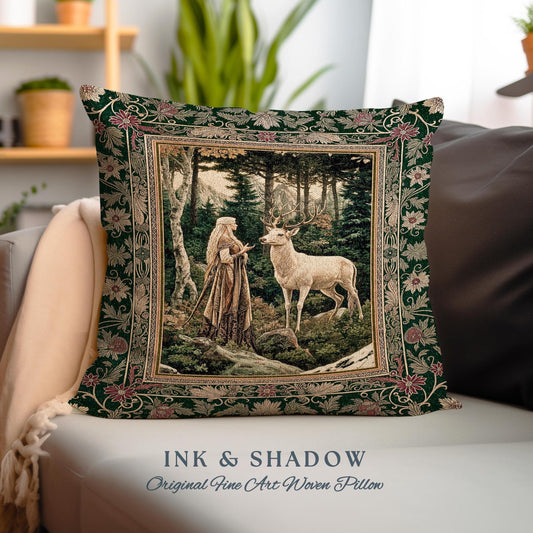 May include: A green throw pillow with a woven tapestry design featuring a woman in a forest with a white deer. The pillow has a gold frame and the text "INK & SHADOW Original Fine Art Woven Pillow" is printed on the bottom.