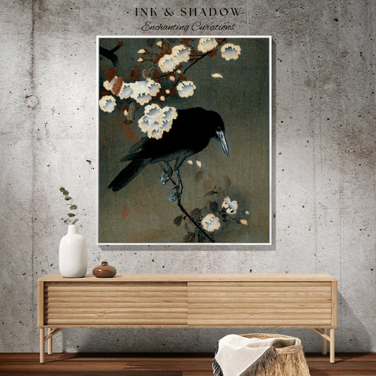 May include: A framed art print featuring a black crow perched on a flowering branch. The artwork has a vintage aesthetic with a dark, muted color palette. The text "INK & SHADOW Enchanting Curations" is at the top.